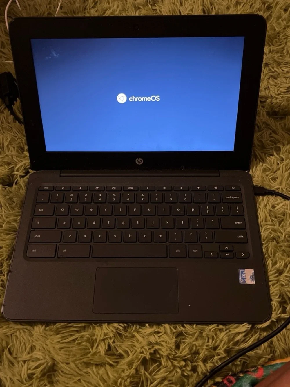 HP Chromebook Black with Chrome OS Logo